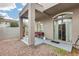 Back patio area featuring a covered space with seating and decorative accents at 2402 E 5Th St # 1742, Tempe, AZ 85288