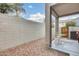 Charming covered patio with desert landscaping, perfect for relaxing and enjoying outdoor living at 2402 E 5Th St # 1742, Tempe, AZ 85288