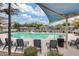 Community pool with ample lounge chairs, a gazebo, and well-maintained landscaping at 2402 E 5Th St # 1742, Tempe, AZ 85288