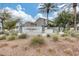 Attractive community entrance signage with lush desert landscaping, creating a welcoming neighborhood atmosphere at 2402 E 5Th St # 1742, Tempe, AZ 85288