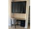 A home office featuring black cabinets, modern decor, and natural lighting at 2486 E Espada Trl, Casa Grande, AZ 85194