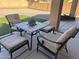 Relaxing patio with a table and four chairs, perfect for outdoor dining at 2486 E Espada Trl, Casa Grande, AZ 85194