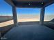 Covered patio with a view of a large, enclosed backyard area at 25330 W Bowker St, Buckeye, AZ 85326