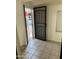 Entryway showing a security door and tile flooring at 2605 W Rose Ln # B101, Phoenix, AZ 85017