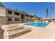 Relaxing community pool area featuring comfortable lounge chairs and crystal-clear water for residents' enjoyment at 2605 W Rose Ln # B101, Phoenix, AZ 85017