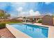 Backyard pool with patio area, shed and a beautiful yard at 2975 E Tulsa St, Gilbert, AZ 85295