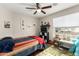 Playful bedroom with a bed, area rug, plush toys, and bright window views at 2975 E Tulsa St, Gilbert, AZ 85295