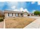Charming single-level home featuring a tile roof and a well-maintained front yard at 2975 E Tulsa St, Gilbert, AZ 85295