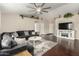 Inviting living room with a large comfortable sectional, open floor plan, and a cozy rug at 2975 E Tulsa St, Gilbert, AZ 85295