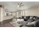 Inviting living room with a large comfortable sectional and a cozy rug at 2975 E Tulsa St, Gilbert, AZ 85295