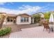 A charming backyard with a brick patio, perfect for enjoying the outdoors and entertaining guests at 3143 N Evergreen St, Buckeye, AZ 85396
