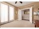 Bonus room featuring carpet, French doors and neutral paint at 3143 N Evergreen St, Buckeye, AZ 85396