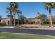 Beautiful clubhouse at Verrado Golf Club features lush landscaping and a welcoming entrance at 3143 N Evergreen St, Buckeye, AZ 85396