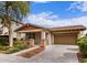 Charming single-story home with a two car garage, landscaped yard, and inviting covered porch at 3143 N Evergreen St, Buckeye, AZ 85396