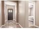 Welcoming foyer boasts sleek flooring and neutral paint creating an inviting atmosphere at 3143 N Evergreen St, Buckeye, AZ 85396