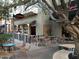 Cozy Tempo cafe features outdoor seating under the shade of mature trees at 3143 N Evergreen St, Buckeye, AZ 85396