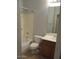 Bathroom featuring a toilet, sink with vanity, and a shower/tub combo at 32020 N 23Rd Ave, Phoenix, AZ 85085