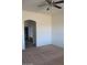Bedroom featuring neutral walls and carpet, complemented by a ceiling fan at 32020 N 23Rd Ave, Phoenix, AZ 85085