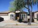 Charming single-story home featuring desert landscaping, a two car garage and a covered entry at 32020 N 23Rd Ave, Phoenix, AZ 85085