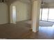 A spacious living room with tile flooring and large sliding glass doors at 32020 N 23Rd Ave, Phoenix, AZ 85085