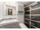 Bathroom featuring a glass-enclosed shower, modern vanity, and mosaic tile accents at 3332 S Ventura Dr, Tempe, AZ 85282