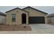 Inviting single-story home with a stucco facade, a two-car garage, and low-maintenance landscaping at 4010 E San Jose St, San Tan Valley, AZ 85143