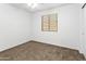 Bedroom with carpeted floors, neutral walls and a window offering natural light at 41176 N Cambria Dr, San Tan Valley, AZ 85140