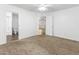 Spacious bedroom with carpeted floors with an attached bath and large closet at 41176 N Cambria Dr, San Tan Valley, AZ 85140