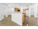 Well-appointed kitchen with breakfast bar, tile flooring, and modern appliances; perfect for entertaining guests at 41176 N Cambria Dr, San Tan Valley, AZ 85140