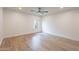 Bright bedroom with wood-look floors and a window at 4201 E Camelback Rd # 28, Phoenix, AZ 85018