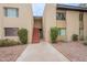 A well-maintained exterior with stairs leading up to units and desert landscaping at 4201 E Camelback Rd # 28, Phoenix, AZ 85018