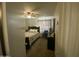 Comfortable bedroom featuring plush carpeting, ceiling fan, and a cozy bed with patterned bedding at 4231 N 69Th Ln # 1325, Phoenix, AZ 85033