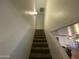 Carpeted staircase leading upwards with white walls on either side at 4231 N 69Th Ln # 1325, Phoenix, AZ 85033