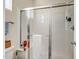 Modern shower with a glass enclosure, chrome fixtures, and tiled walls at 42424 N Gavilan Peak Pkwy # 25102, Anthem, AZ 85086