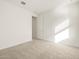 Bright and airy bedroom with neutral carpet and ample natural light at 4271 W Josephine St, San Tan Valley, AZ 85144