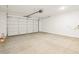 Spacious garage with an automatic door and ample storage at 4271 W Josephine St, San Tan Valley, AZ 85144