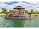 Picturesque community feature with a decorative gazebo set amidst a tranquil lake, a visual delight at 4727 S Watauga Dr, Gilbert, AZ 85297