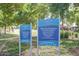 A shot of the Layton Lakes community signage describing the area and hours of operation at 4727 S Watauga Dr, Gilbert, AZ 85297