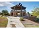 A view of the community gazebo showing stone pillars and an observation deck on a sunny day at 4727 S Watauga Dr, Gilbert, AZ 85297