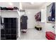 Organized walk-in closet with shelving, rods, and ample storage space for clothes and accessories at 4727 S Watauga Dr, Gilbert, AZ 85297