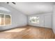 Bright living room with hardwood floors and ample natural light at 5025 N 85Th Dr, Glendale, AZ 85305