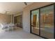 Expansive balcony with outdoor dining area, seamlessly blending indoor and outdoor living with stunning views at 5250 E Deer Valley Dr # 246, Phoenix, AZ 85054