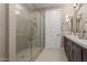 The bathroom features a glass-enclosed shower and dual sinks with modern fixtures at 5250 E Deer Valley Dr # 246, Phoenix, AZ 85054