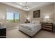This bedroom features a large window with scenic views and stylish decor at 5250 E Deer Valley Dr # 246, Phoenix, AZ 85054