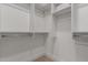 Spacious walk-in closet with custom shelving and ample storage, designed for organized and efficient wardrobe management at 5250 E Deer Valley Dr # 246, Phoenix, AZ 85054