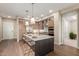 Bright kitchen with modern finishes, stainless steel appliances, and a central island for seating at 5250 E Deer Valley Dr # 246, Phoenix, AZ 85054