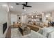 Open-concept living room with modern furnishings and kitchen in view at 5250 E Deer Valley Dr # 246, Phoenix, AZ 85054