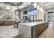 Luxurious lobby showcasing high ceilings, stylish lighting, modern kitchen, and a comfortable seating area at 5250 E Deer Valley Dr # 246, Phoenix, AZ 85054