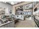 Modern community lounge with comfortable seating, contemporary lighting, and an open floor plan at 5250 E Deer Valley Dr # 246, Phoenix, AZ 85054