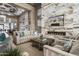 Stylish lounge area with elegant seating, fireplace, and marble accent wall at 5250 E Deer Valley Dr # 246, Phoenix, AZ 85054